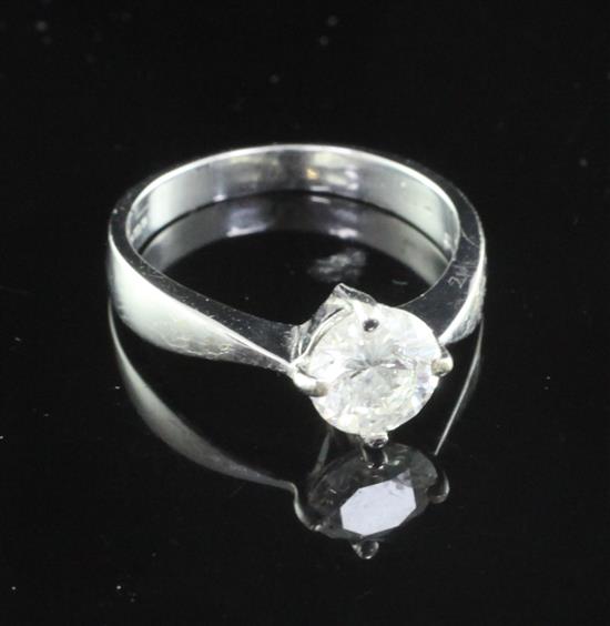 An 18ct white gold and solitaire diamond ring, size M.